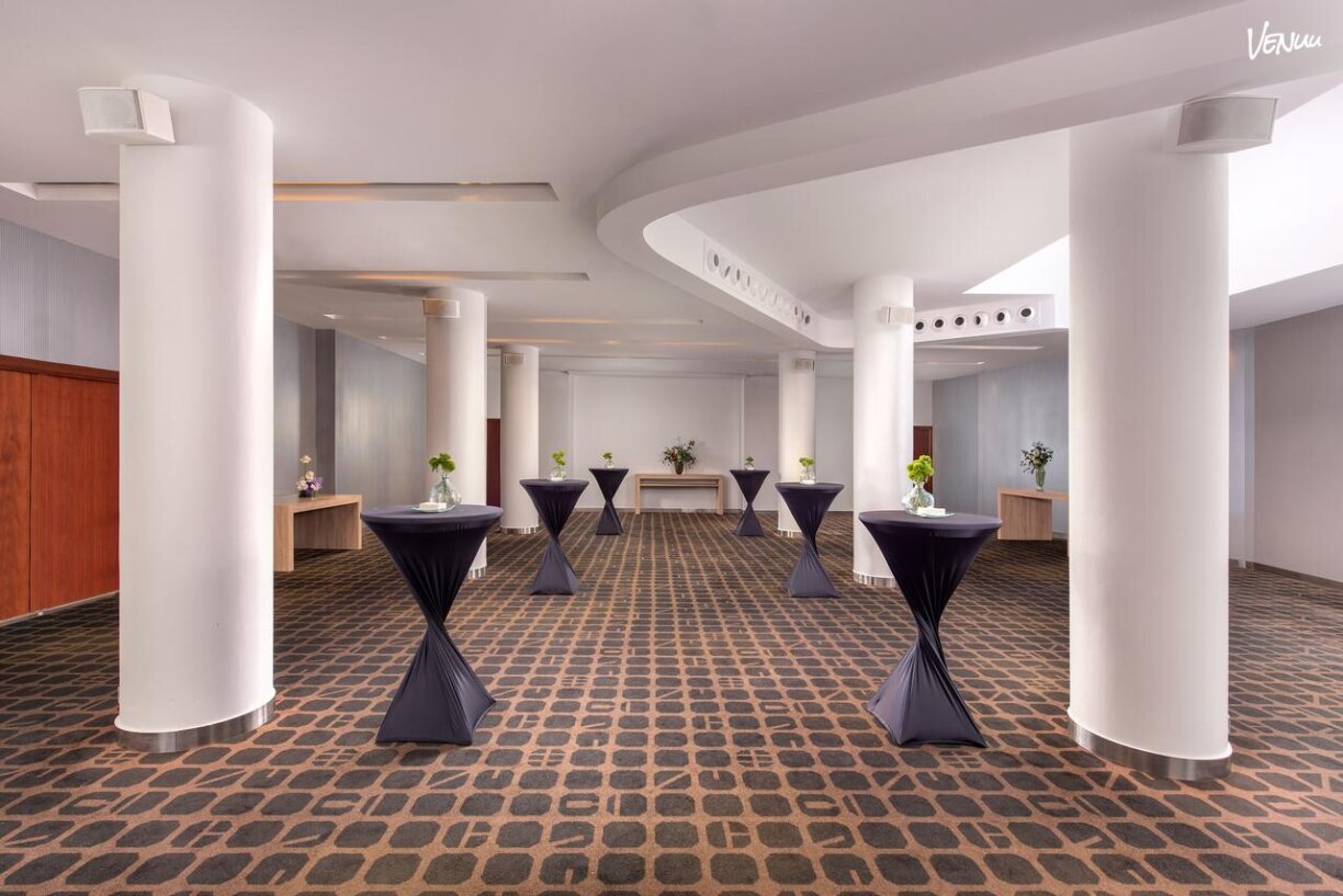 Salón de Le Meridien Liceu, un clásico para cenas corporativas elegantes.